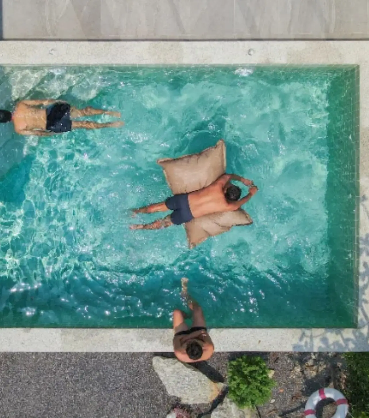 Guests in the private pool, from above