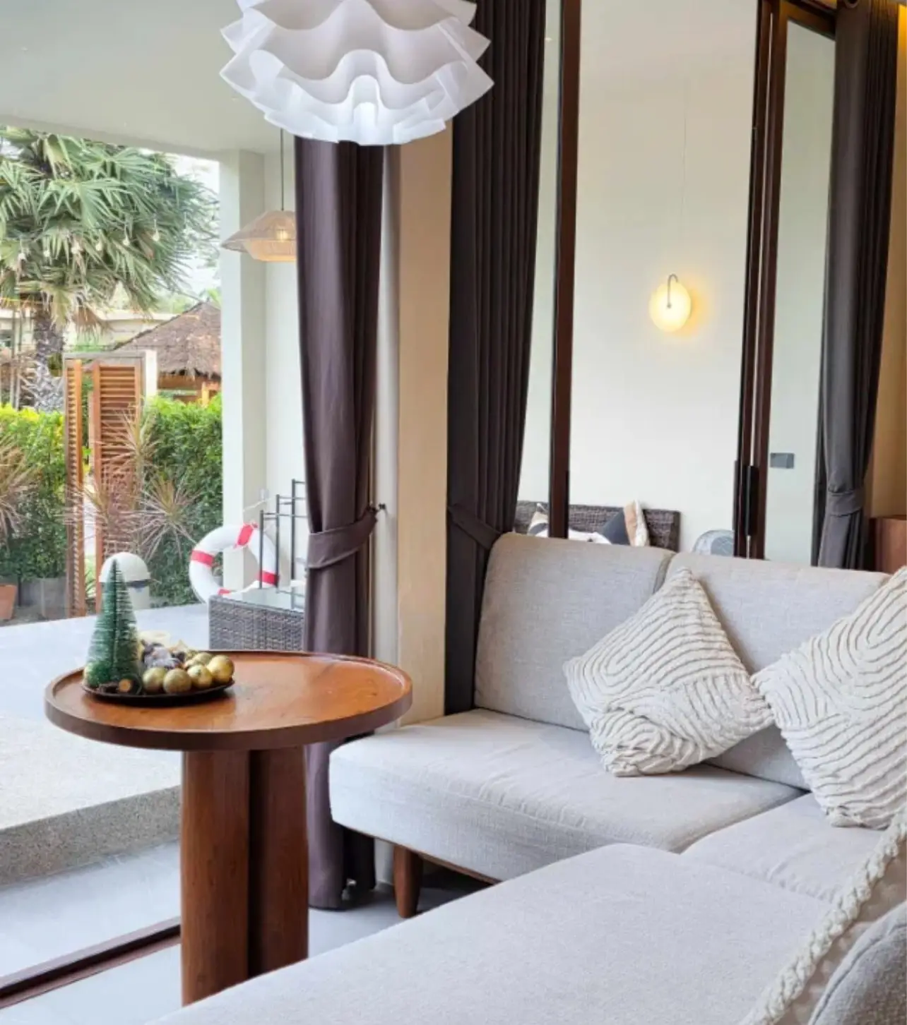 Living room opening to the pool