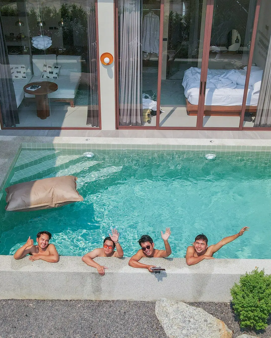 Guests relaxing in a private pool